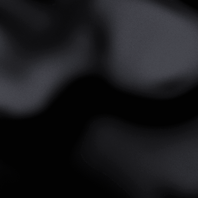 Abstract gradient image transitioning from dark to light shades of gray.